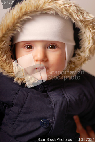 Image of Child in a warm hood