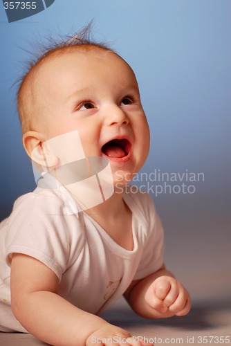 Image of A cheery smiling little boy