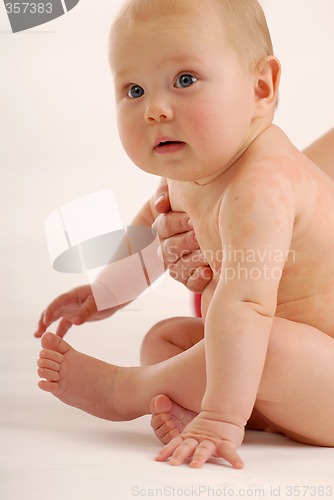 Image of A baby looking around