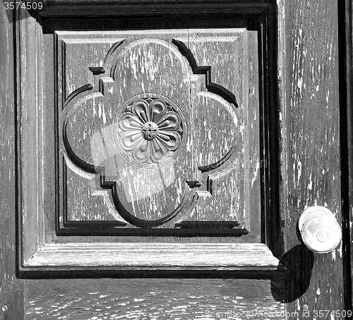 Image of  traditional   door    in italy   ancian wood and traditional  t