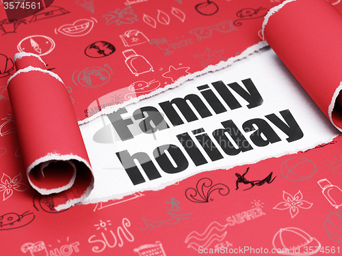 Image of Tourism concept: black text Family Holiday under the piece of  torn paper