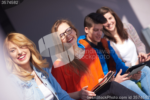 Image of students group working on school  project  together