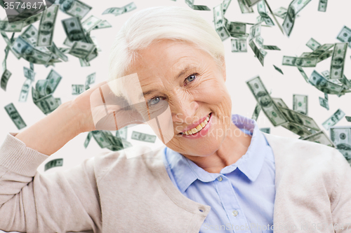 Image of happy senior woman face over violet background