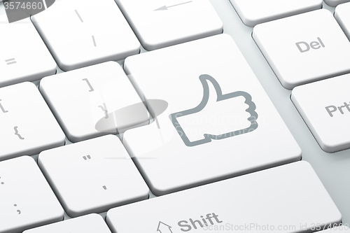 Image of Social media concept: Thumb Up on computer keyboard background