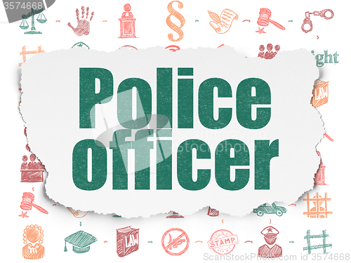 Image of Law concept: Police Officer on Torn Paper background