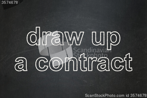 Image of Law concept: Draw up A contract on chalkboard background