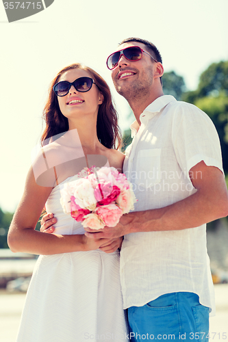 Image of smiling couple in city