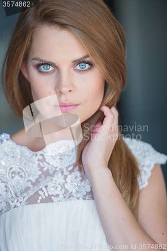 Image of Close Up of Woman Wearing White Lacy Top