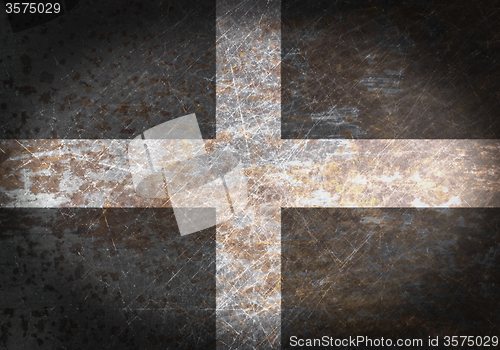 Image of Old rusty metal sign with a flag