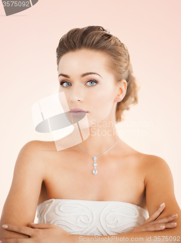 Image of woman with diamond necklace