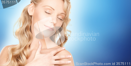 Image of beautiful young happy woman with long hair