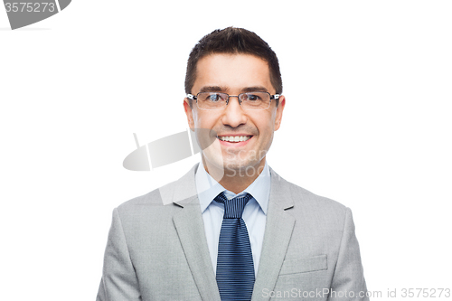 Image of happy smiling businessman in eyeglasses and suit