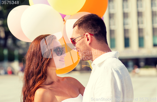 Image of smiling couple in city