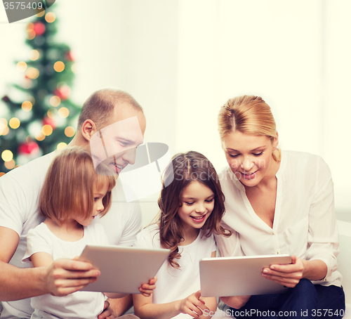 Image of happy family with tablet pc computers