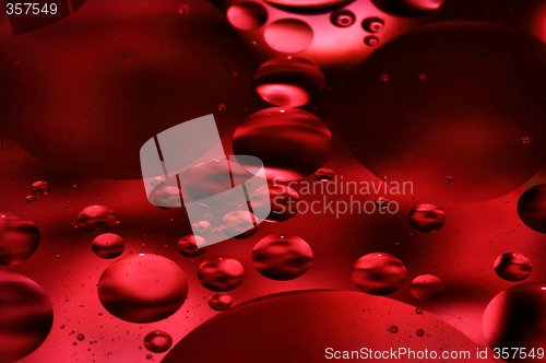 Image of red floating bubbles