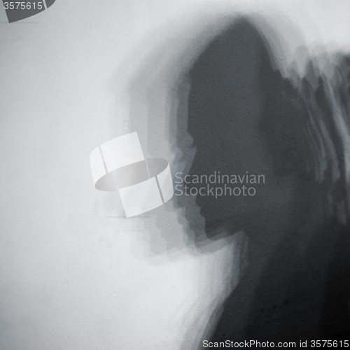 Image of shadow of woman face