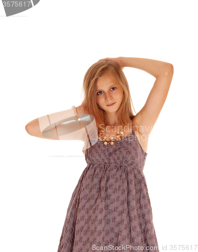 Image of Lovely girl in burgundy dress.