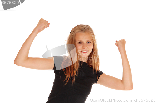 Image of Happy young girl raising her arms.