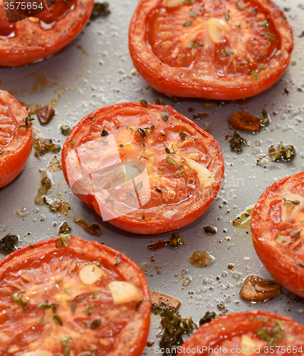 Image of Roast tomatoes, seasoned with thyme and garlic