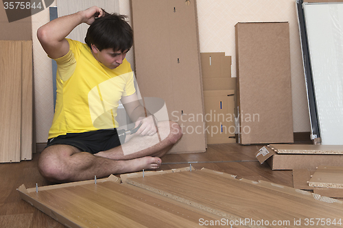 Image of Assembling furniture at home