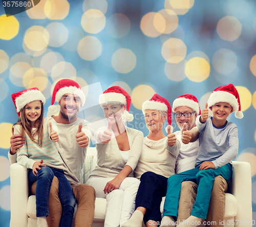 Image of happy family sitting on couch