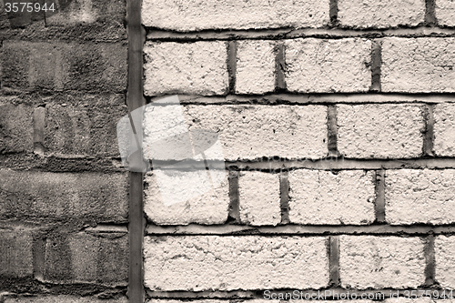 Image of in london abstract    texture of a ancien wall and ruined brick