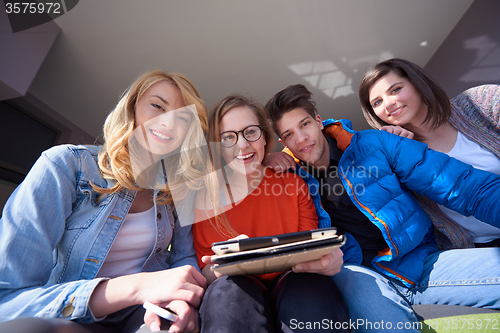Image of students group working on school  project  together