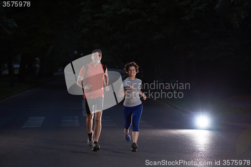 Image of couple jogging at early morning