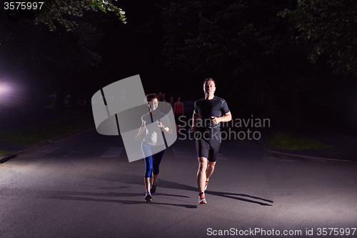 Image of couple jogging at early morning