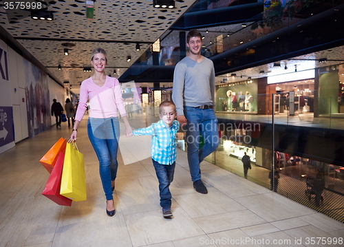 Image of young family with shopping bags