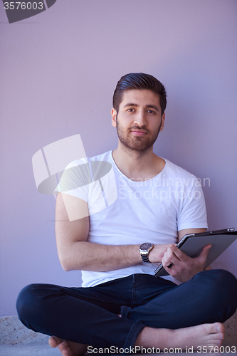 Image of student working on tablet