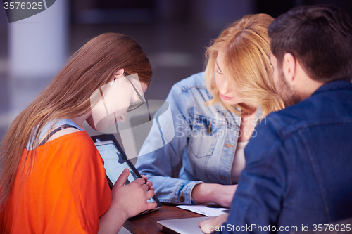 Image of students group working on school  project  together