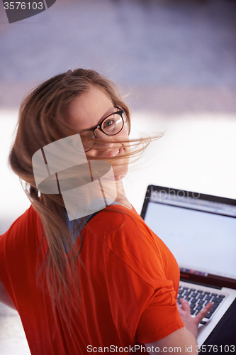 Image of student girl with laptop computer