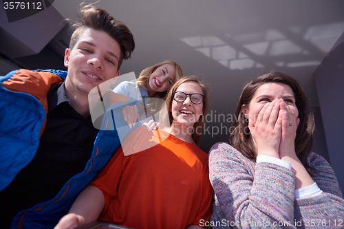 Image of students group working on school  project  together