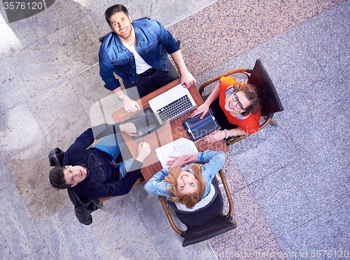 Image of students group working on school  project  together