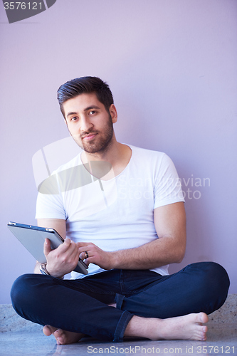 Image of student working on tablet
