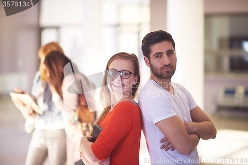 Image of students couple standing together