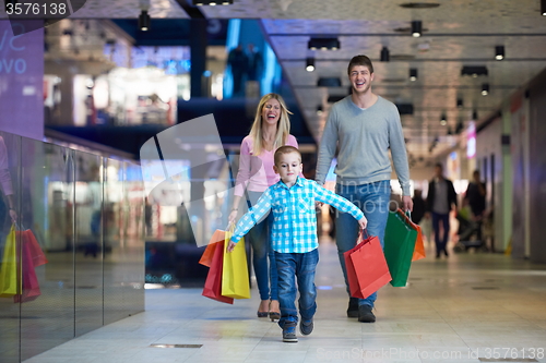 Image of young family with shopping bags