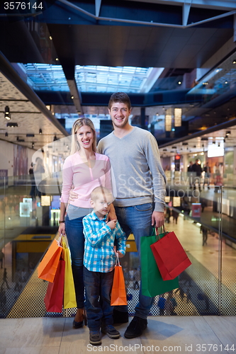 Image of young family with shopping bags