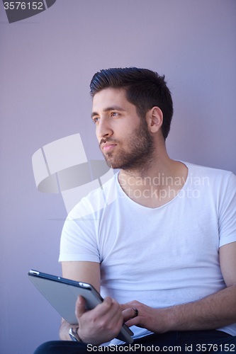 Image of student working on tablet