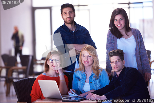Image of students group standing together as team