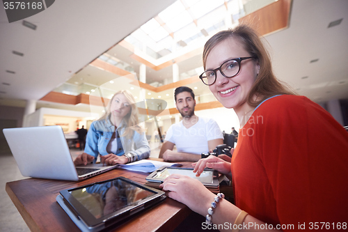 Image of students group working on school  project  together