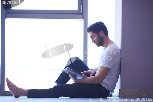 Image of student working on tablet