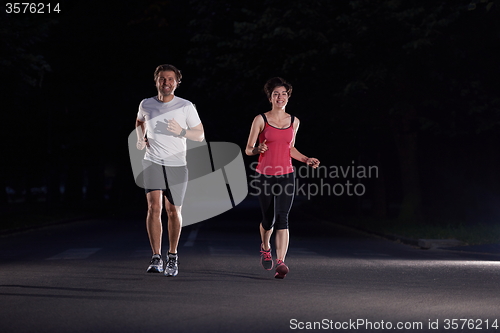 Image of couple jogging at early morning