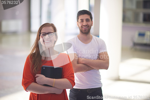 Image of students couple standing together