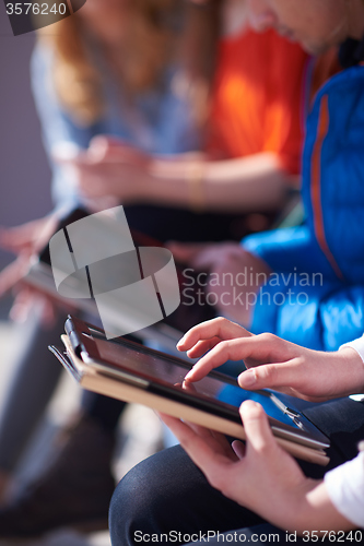 Image of students group working on school  project  together