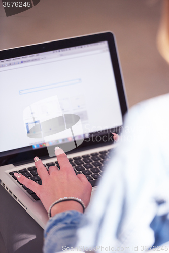 Image of student girl with laptop computer