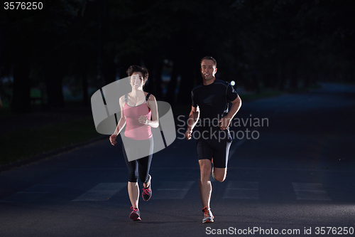 Image of couple jogging at early morning