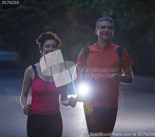 Image of couple jogging at early morning