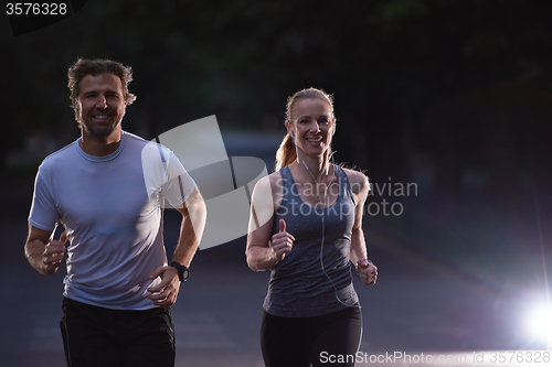 Image of couple jogging at early morning